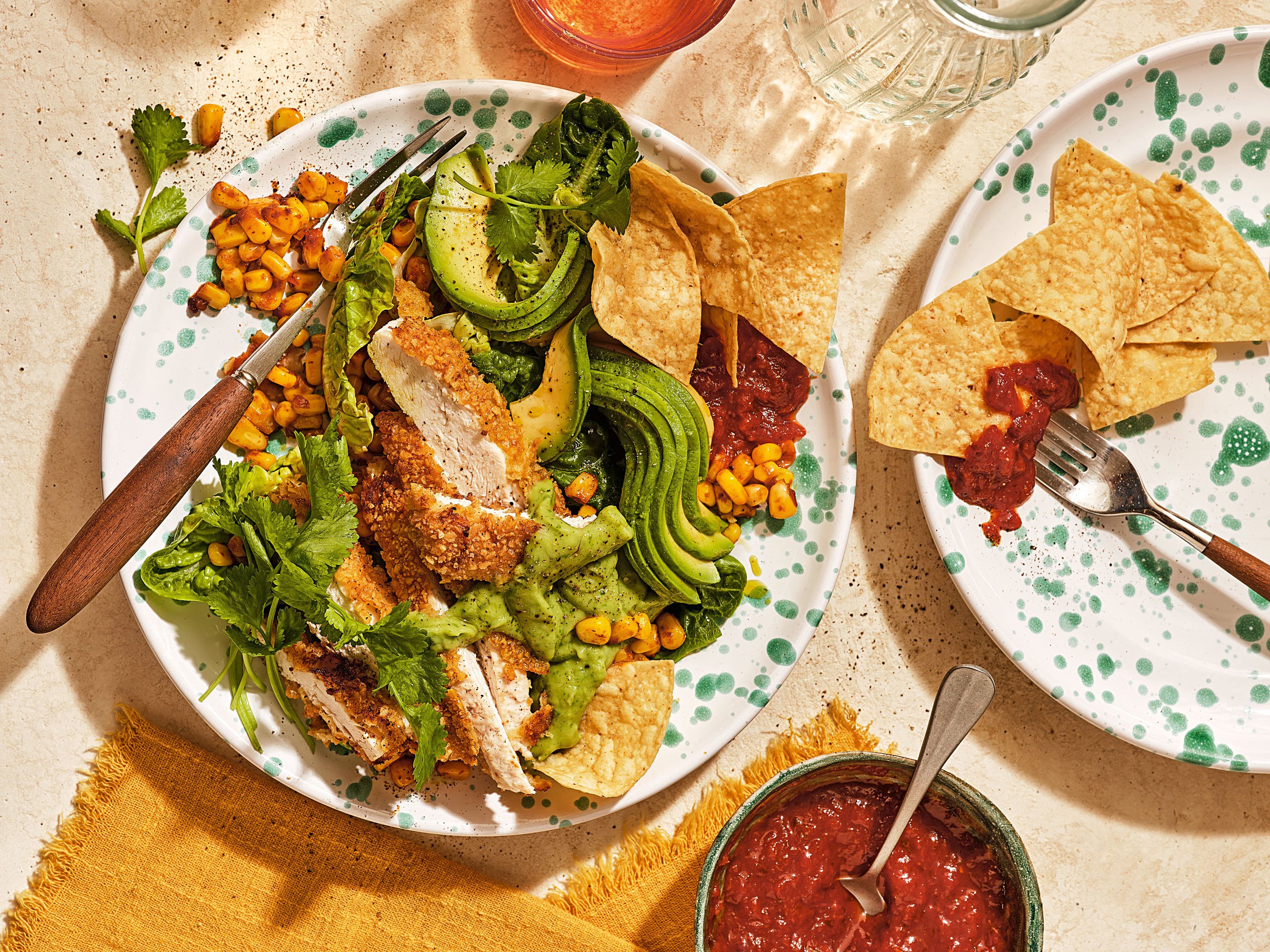 Tortilla-crumbed chicken with avocado salad 