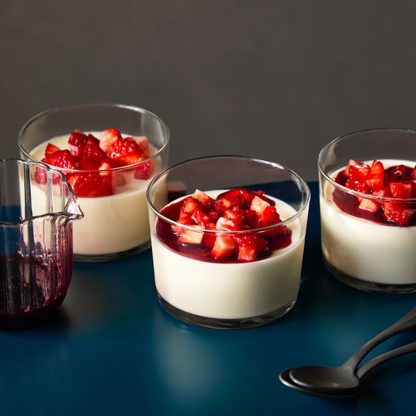 Panna cottas with strawberry, hibiscus &amp; elderflower syrup