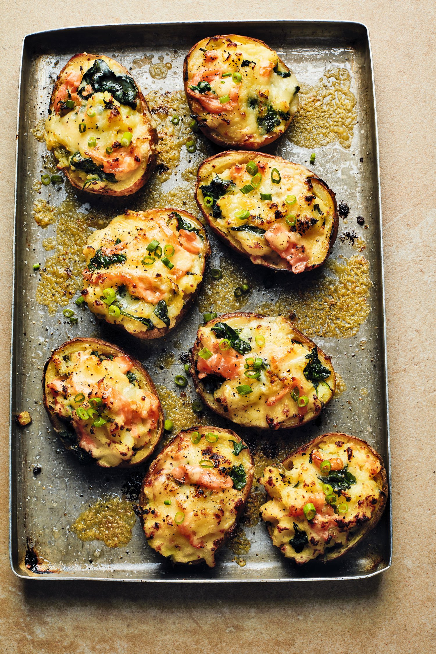 Loaded potato skins with Cheddar, spinach & smoked salmon