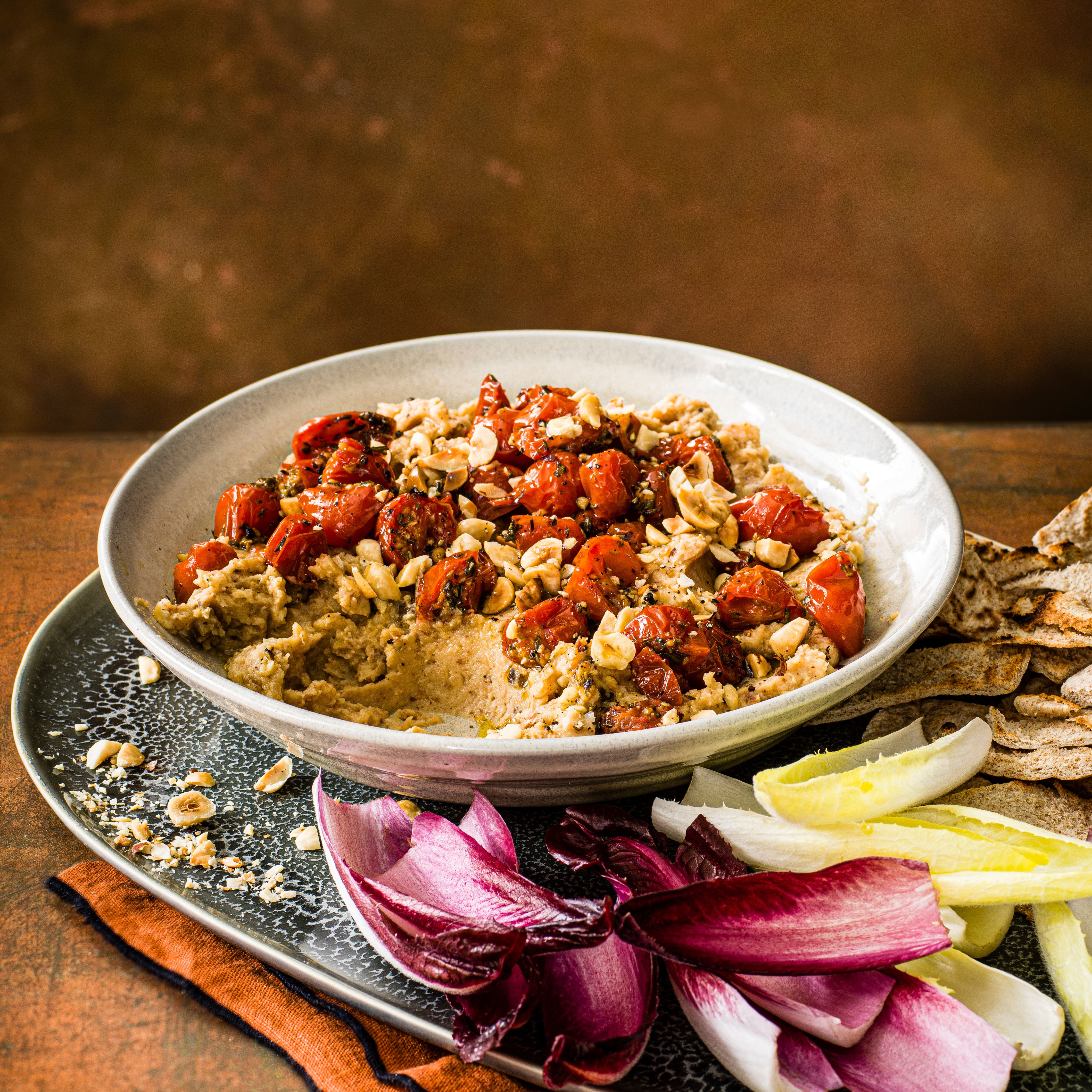 Parsnip, bean & hazelnut dip with sweet tomatoes