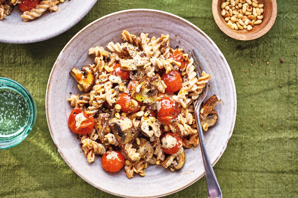 Red lentil pasta with cheesy cashew cream, balsamic roasted