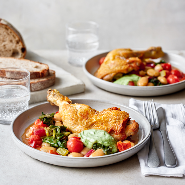 Crispy roast chicken with tomatoey butter beans