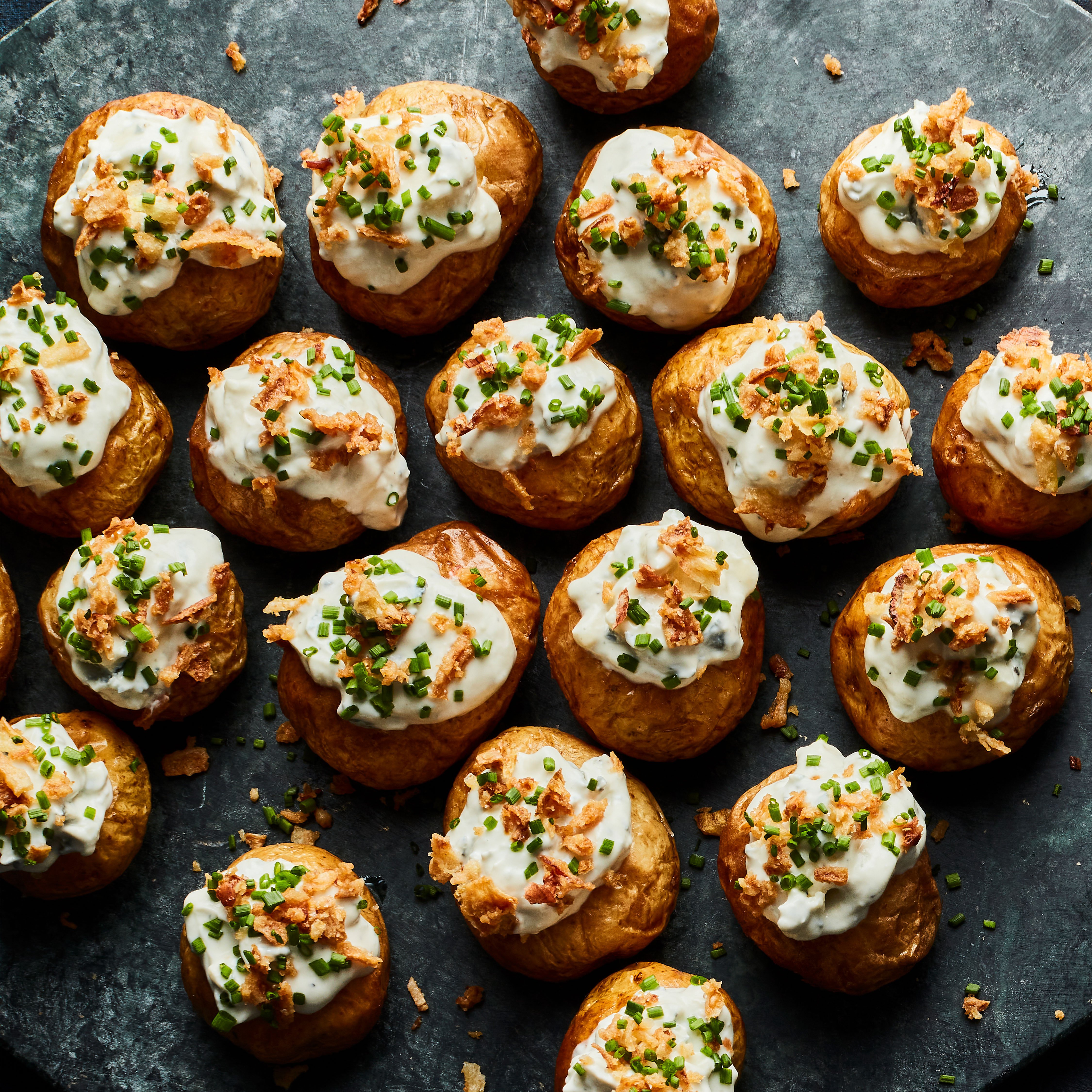 Baby jacket spuds with blue cheese & crispy onions