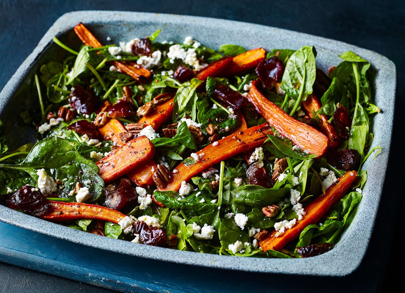 Roasted carrots with spinach, pecans and dates